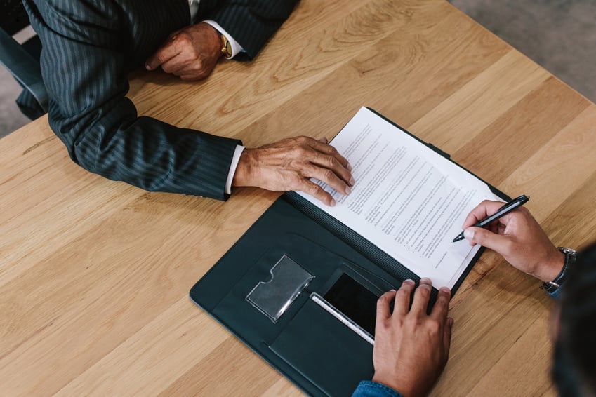 Two Business Men Signing Contract